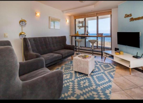 Deluxe Beachfront Apartment